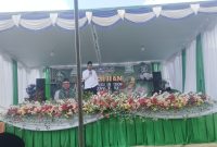 Kasi Bimas Islam Kemenag Melawi, Nono Somantri menyampaikan sambutan mewakili Kepala Kantor Kementerian Agama Kabupaten Melawi pada peringatan Harlah ke-92 GP Ansor dan Harlah ke-76 Fatayat NU di Desa Batu Buil, Kecamatan Belimbing, Ahad (24/05). Dalam sambutannya, ia mengajak seluruh elemen masyarakat untuk memperkuat persatuan, menjaga kedaulatan NKRI, serta mendorong peran aktif GP Ansor dalam pembinaan pemuda dan Fatayat NU dalam pemberdayaan ekonomi umat.